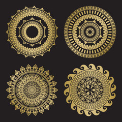 Gold color round abstract ethnic ornament mandalas