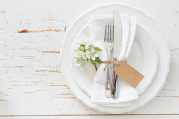 Spring table setting with white flowers - Powered by Adobe
