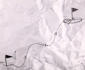 Crumpled paper with scheme way.