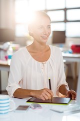 Fototapeta premium Businesswoman using graphic tablet