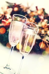 Two champagne glasses.