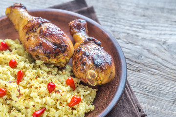 Spicy chicken drumsticks with rice curry