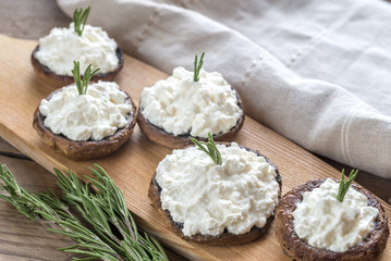 Baked mushrooms stuffed with cream cheese