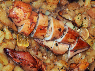 Fried squid stuffed with ham cheese and tentacles