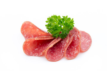 Salami smoked sausages slices isolated on white background.