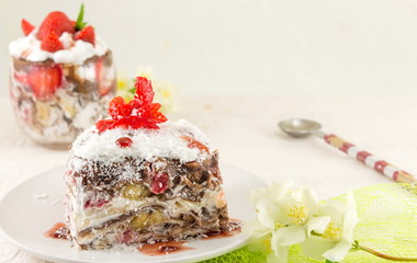 Strawberry cake served on a white plate