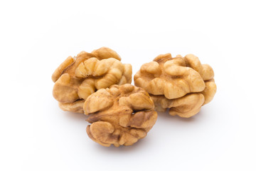 Walnut and walnut kernel isolated on the white background.