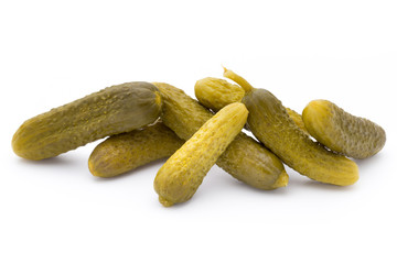 Marinated pickled cucumbers isolated on the white.