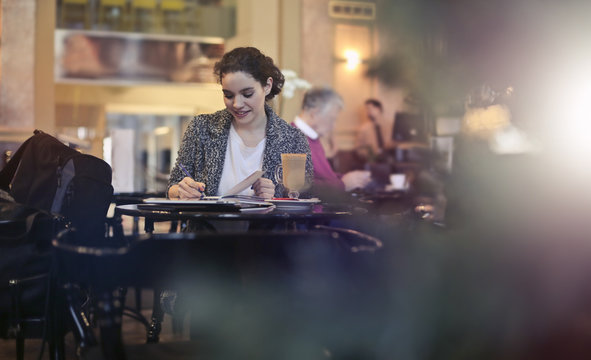 Pretty woman sitting in a cafe
