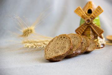 Sliced bread on a gray background.