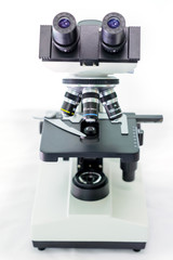 Fototapeta na wymiar laboratory microscope with stereo eyepiece isolated on a white background