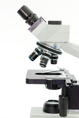 laboratory microscope with stereo eyepiece isolated on a white background