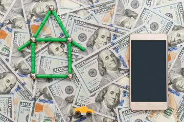 Home, car and phone on money