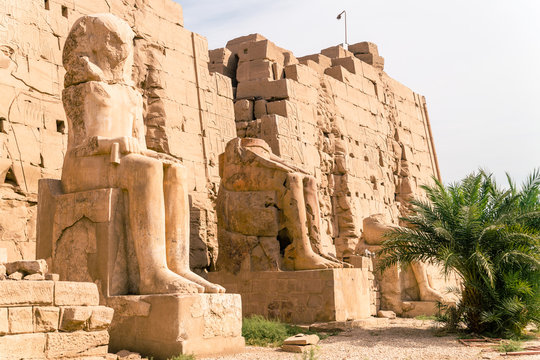 LUXOR, EGYPT  Ancient ruins of Karnak temple in Egypt at noon. The complex is a vast open-air museum, and the second largest ancient religious site in the world