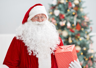 Close-up of Santa Claus brought gifts for Christmas. Home decora