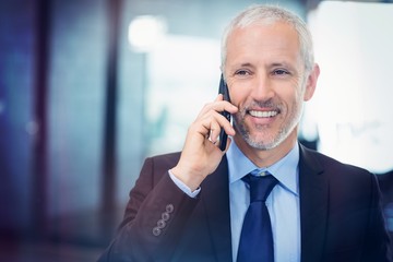 Businessman talking on mobile phone