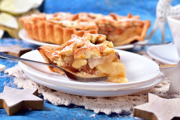 piece of christmas apple pie with star shape decoration