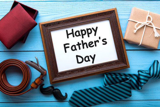 Happy Father's Day set of things on wooden table background. Topview