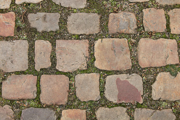 Texture - a pedestrian street lined with cobblestone of unusual shape