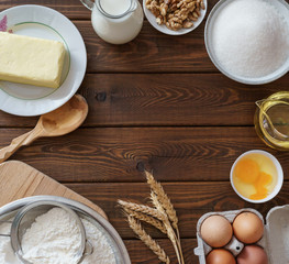 Ingredients for cooking on wooden background. Food background with copyspace. 
