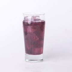 Fototapeta na wymiar Grape juice in a glass with ice.