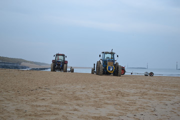 tractors on beach 