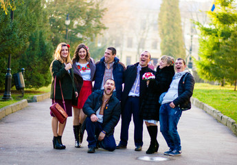 Happy people posing in the park