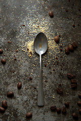 Silver spoons coffee bean on dark vintage