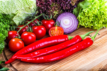 Different raw vegetables background.Cheese.