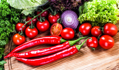 Different raw vegetables background.Cheese.