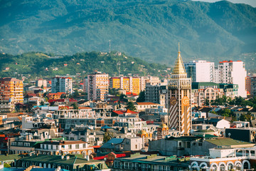 Fototapeta na wymiar Cityscape Of Georgian Resort Town Of Batumi. Different Colored Houses