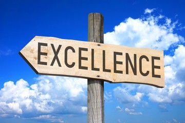 Excellence - wooden signpost