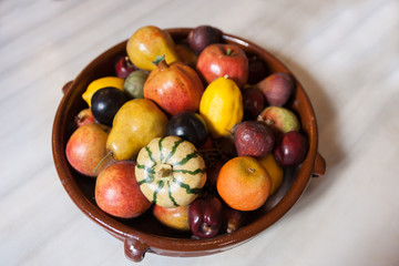 Obraz na płótnie Canvas Bowl of fruit close up.