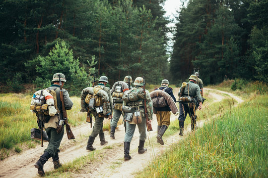 Unidentified Re-enactors Dressed As German Soldiers Marching Alo