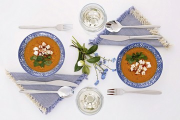 Plates and glasses, romantic dinner for two. Homey atmosphere 