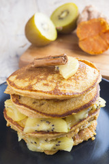 Pancakes of yam and kiwi
