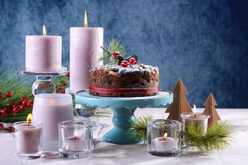 Festive holiday table with English style Christmas fruit cake