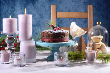 Festive holiday table with English style Christmas fruit cake