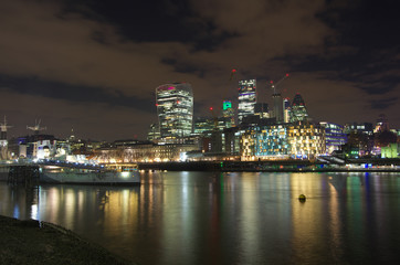 Fototapeta na wymiar London City skyline by night from the riverside