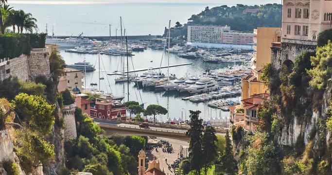 Timelapse of Preparation for a World Fair of the yacht show Monaco from railway station Monaco, is placed by megayachts, MYS, on the horizon yachts, the old city of Monaco