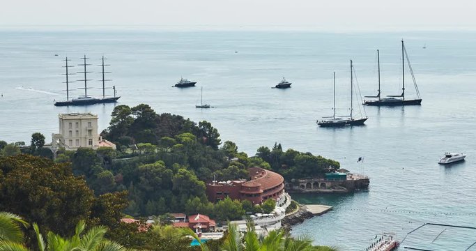 Timelapse of Monte Carlo's bay, the moored sailing megayachts expecting the beginning of a World Fair of yachts show in Monaco, MYS, Falcon Maltesse