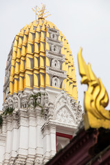 Golden pagoda with Kanok.