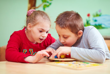 kids with special needs develop their fine motor skills in daycare rehabilitation center