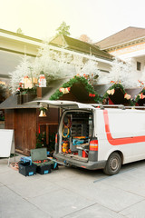 White van with diverse tools in the back preparing to arrange the Christmas stall at the...