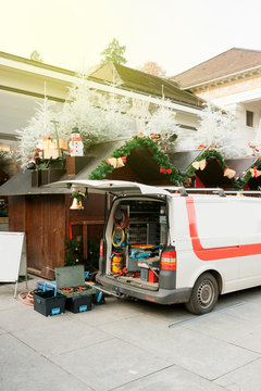 White van with diverse tools in the back preparing to arrange the Christmas stall at the Baden-Baden Christmas market