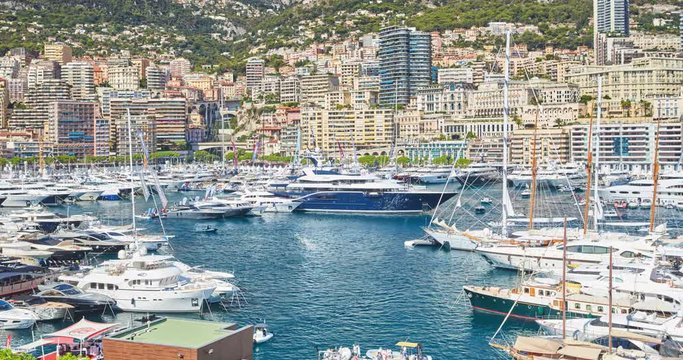 World Fair MYS Monaco Yacht Show, Port Hercules, luxury megayachts, many shuttles, taxi boat, presentations, Journalists, boat traffic, Azur water, aerial view, mountains on background, perspective