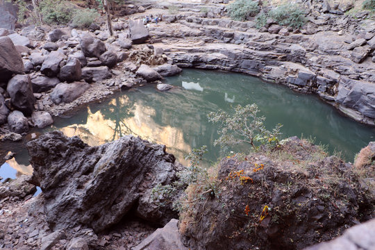 Gapernath cave temple and tourist-cum-religious spot in Kota, India. An adventurous staircase leading down to the place is known for an ancient cave temple of Shiva and a waterfall.