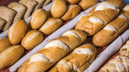 Breads lined up. Assortment of a baked breads