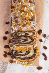 Homemade poppy seeds cake on rustic board, dessert for Christmas