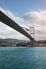 Naklejka premium Iconic Istanbul view with the Bosphorus Bridge during and Beylerbeyi Palace during winter